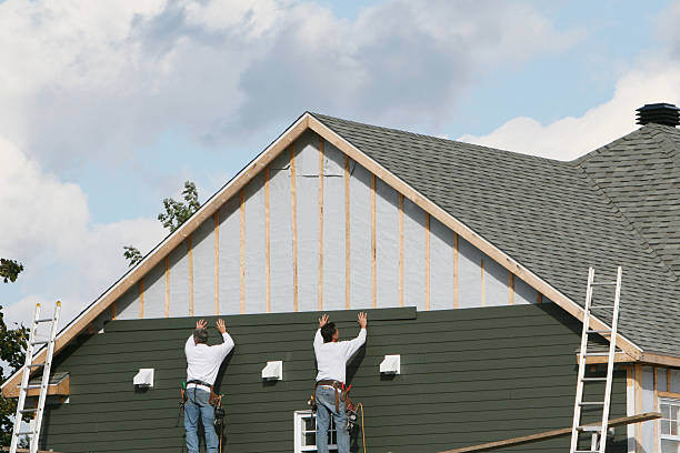 Professional Siding Replacement technician working in Rolling Meadows, IL